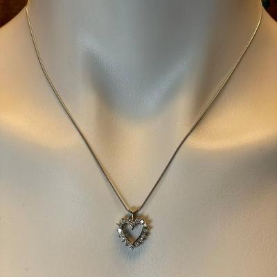 14 k Gold and ruby diamond heart pendant and chain 20 in 9.2 g