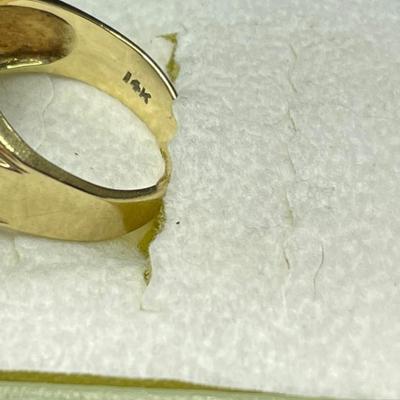 14 k Gold and diamond ring size 8 Reserve set