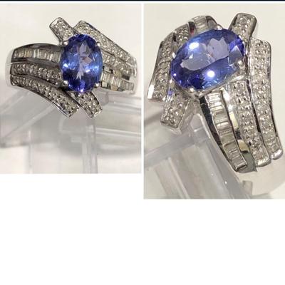 14 k white gold ring Reserve set