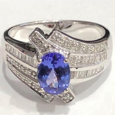 14 k white gold ring Reserve set