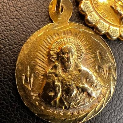 14 k Gold chain and religous pendants