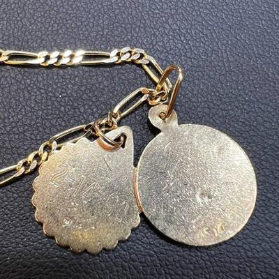 14 k Gold chain and religous pendants