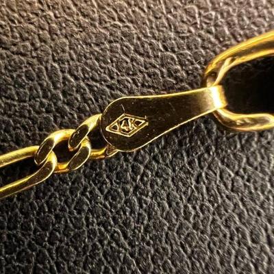 14 k Gold chain and religous pendants