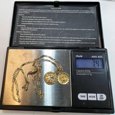 14 k Gold chain and religous pendants