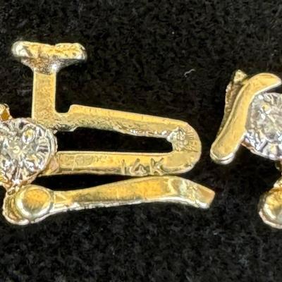 14 k Gold and diamond tennis bracelet