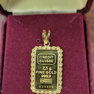 14 k Gold necklace 999 charm