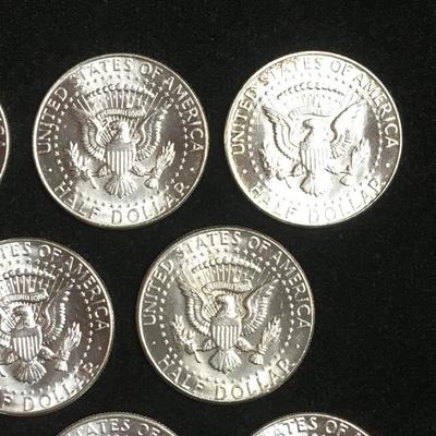 10 bu 1964 Kennedy half dollars