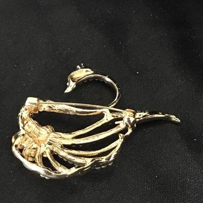 Gold tone swan pin