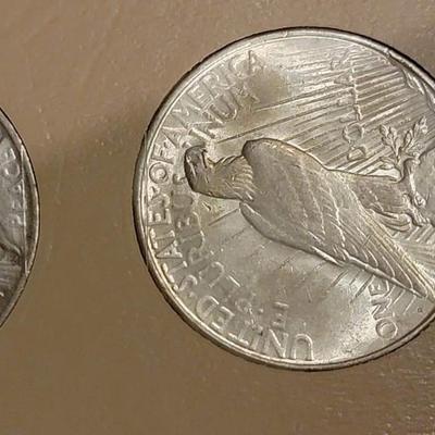 Complete peace dollar book including Rare 1921 thru 1935 reserve set