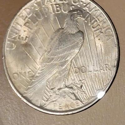 Complete peace dollar book including Rare 1921 thru 1935 reserve set