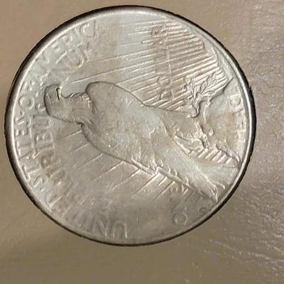 Complete peace dollar book including Rare 1921 thru 1935 reserve set