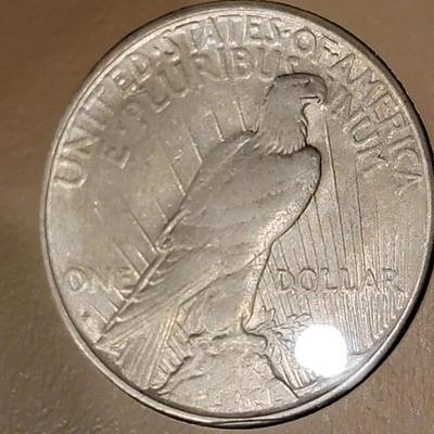 Complete peace dollar book including Rare 1921 thru 1935 reserve set