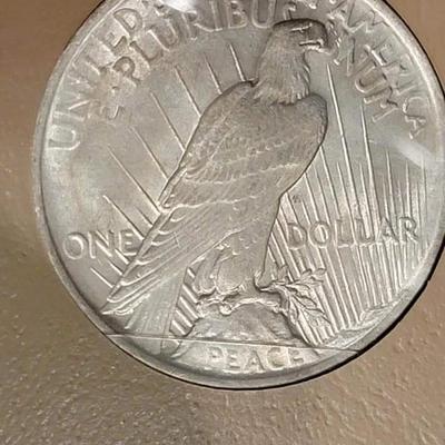 Complete peace dollar book including Rare 1921 thru 1935 reserve set