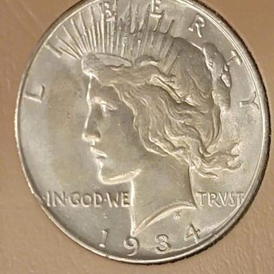 Complete peace dollar book including Rare 1921 thru 1935 reserve set