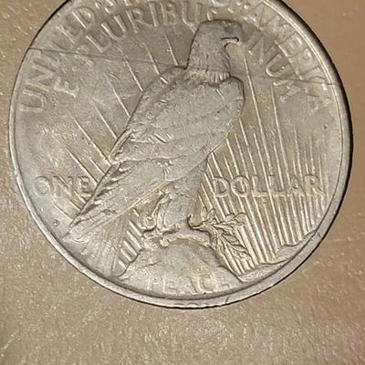 Complete peace dollar book including Rare 1921 thru 1935 reserve set
