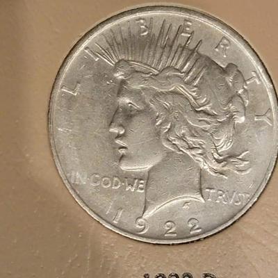 Complete peace dollar book including Rare 1921 thru 1935 reserve set