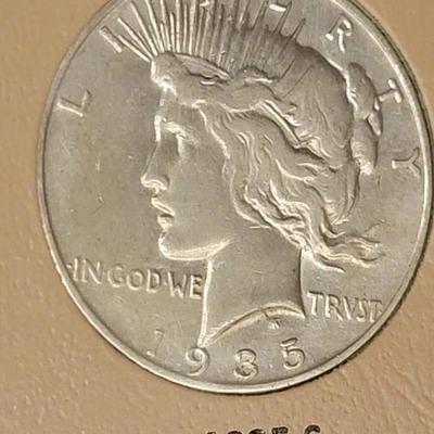 Complete peace dollar book including Rare 1921 thru 1935 reserve set