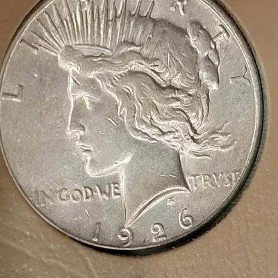 Complete peace dollar book including Rare 1921 thru 1935 reserve set