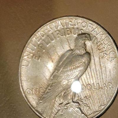 Complete peace dollar book including Rare 1921 thru 1935 reserve set