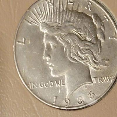 Complete peace dollar book including Rare 1921 thru 1935 reserve set