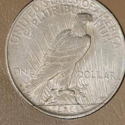 Complete peace dollar book including Rare 1921 thru 1935 reserve set