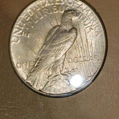 Complete peace dollar book including Rare 1921 thru 1935 reserve set