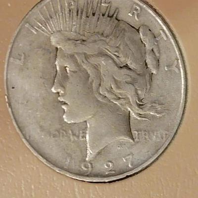 Complete peace dollar book including Rare 1921 thru 1935 reserve set