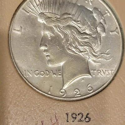 Complete peace dollar book including Rare 1921 thru 1935 reserve set