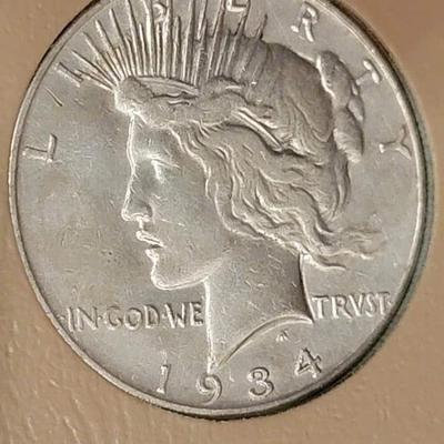 Complete peace dollar book including Rare 1921 thru 1935 reserve set