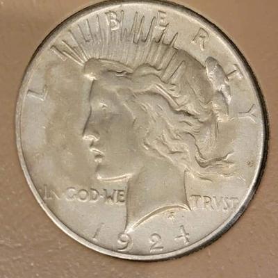 Complete peace dollar book including Rare 1921 thru 1935 reserve set