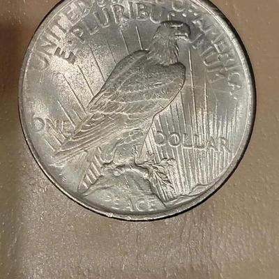 Complete peace dollar book including Rare 1921 thru 1935 reserve set