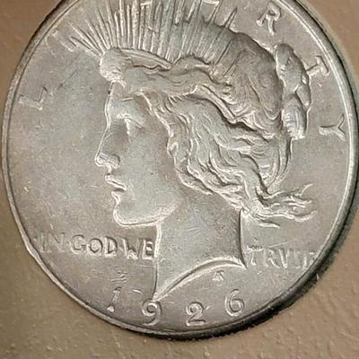 Complete peace dollar book including Rare 1921 thru 1935 reserve set
