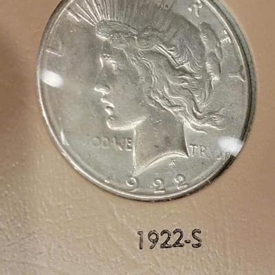 Complete peace dollar book including Rare 1921 thru 1935 reserve set