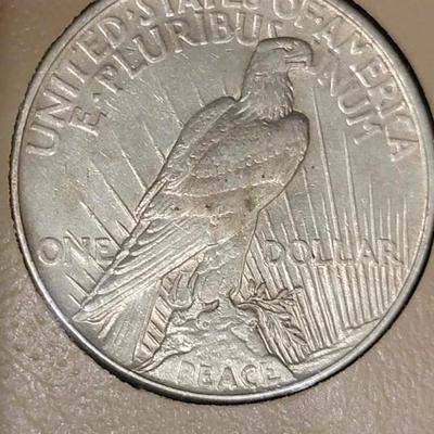 Complete peace dollar book including Rare 1921 thru 1935 reserve set