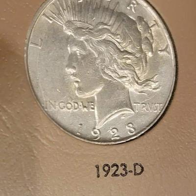 Complete peace dollar book including Rare 1921 thru 1935 reserve set