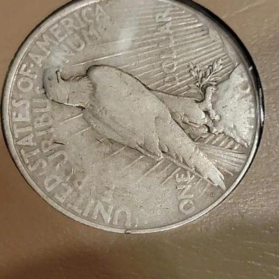 Complete peace dollar book including Rare 1921 thru 1935 reserve set
