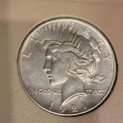 Complete peace dollar book including Rare 1921 thru 1935 reserve set
