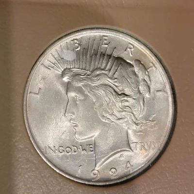 Complete peace dollar book including Rare 1921 thru 1935 reserve set