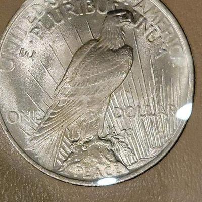 Complete peace dollar book including Rare 1921 thru 1935 reserve set