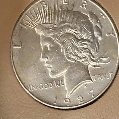 Complete peace dollar book including Rare 1921 thru 1935 reserve set