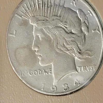 Complete peace dollar book including Rare 1921 thru 1935 reserve set