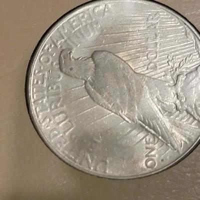 Complete peace dollar book including Rare 1921 thru 1935 reserve set