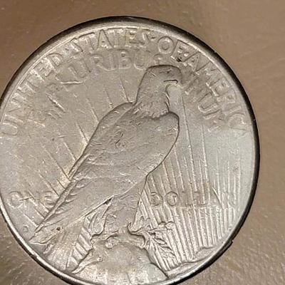 Complete peace dollar book including Rare 1921 thru 1935 reserve set