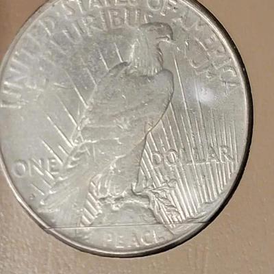 Complete peace dollar book including Rare 1921 thru 1935 reserve set