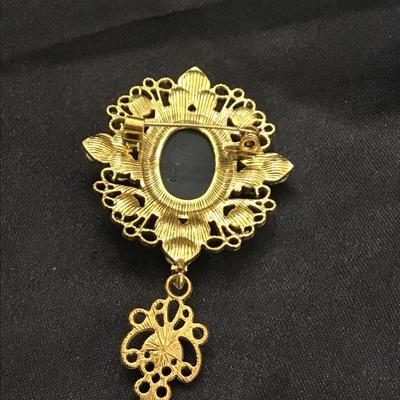 Inspired Black/White Acrylic Crystal Cameo Brooch in Aged Gold Tone