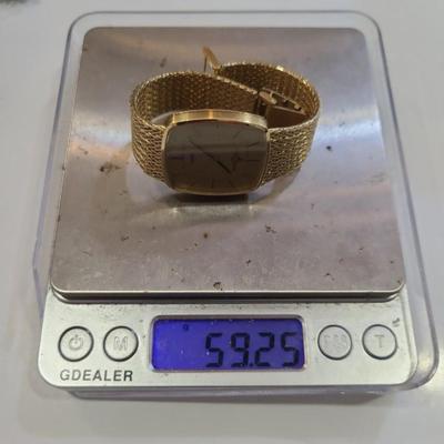 Vintage Baum & Mercier 14 k solid Gold watch Reserve set