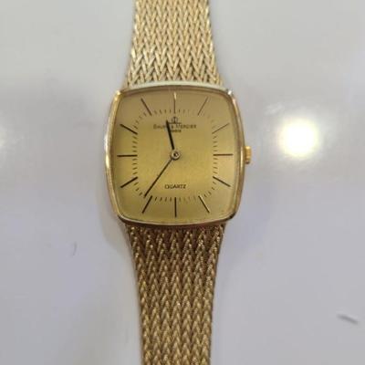 Vintage Baum & Mercier 14 k solid Gold watch Reserve set