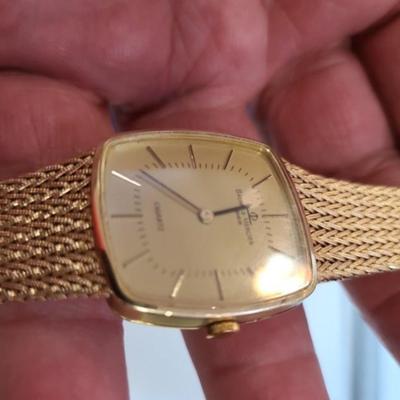 Vintage Baum & Mercier 14 k solid Gold watch Reserve set