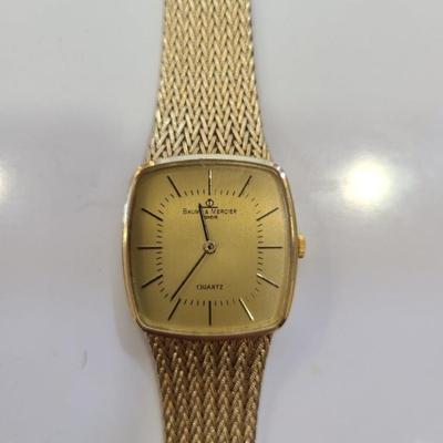 Vintage Baum & Mercier 14 k solid Gold watch Reserve set
