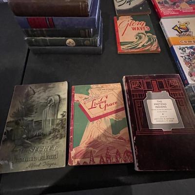 AN ASSORTMENT OF VINTAGE BOOKS